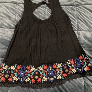 Black Torrid tank with floral detail